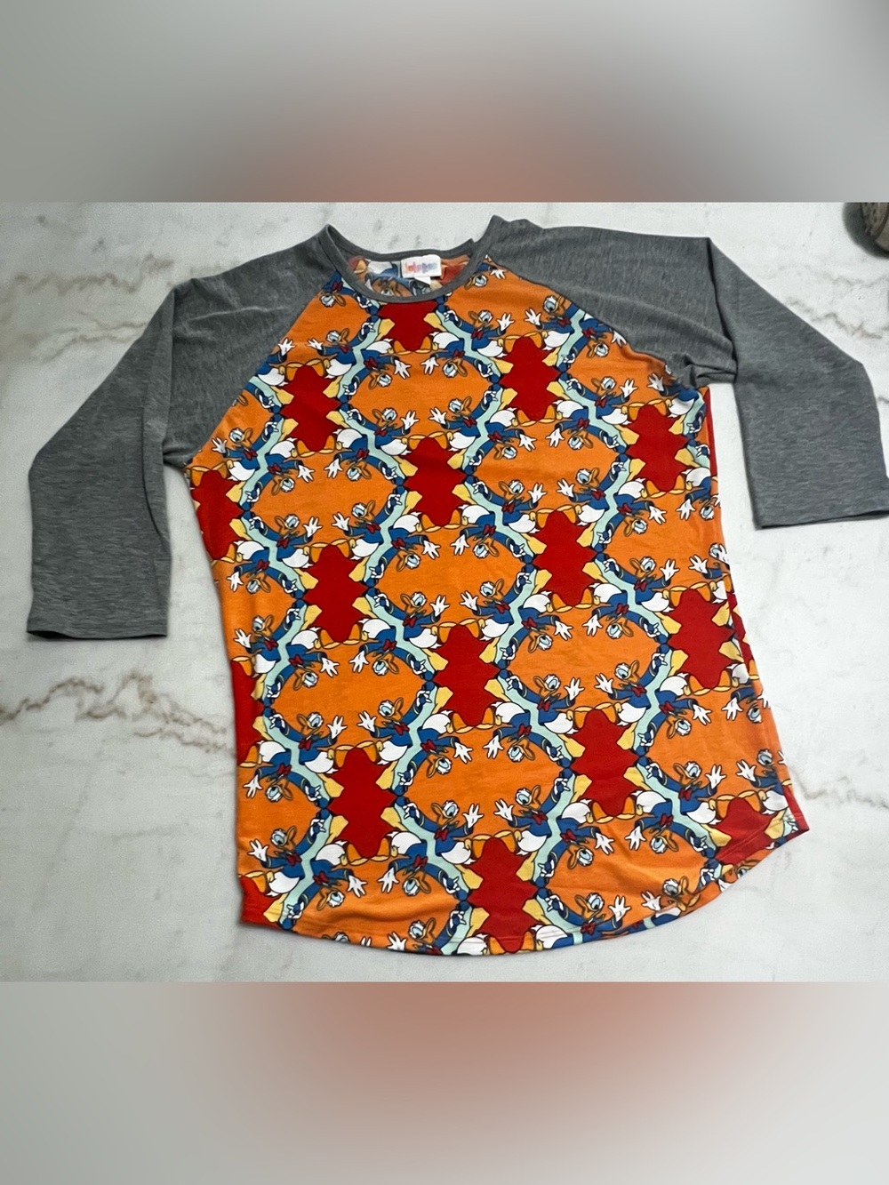 LuLaRoe Disney Donald Duck Repeating PatternRandy  Raglan Sleeve T-shirt Medium